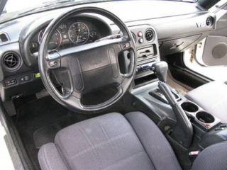 Illustration for article titled For $29,000, This 1991 Mazda Miata Has A Surprising V8
